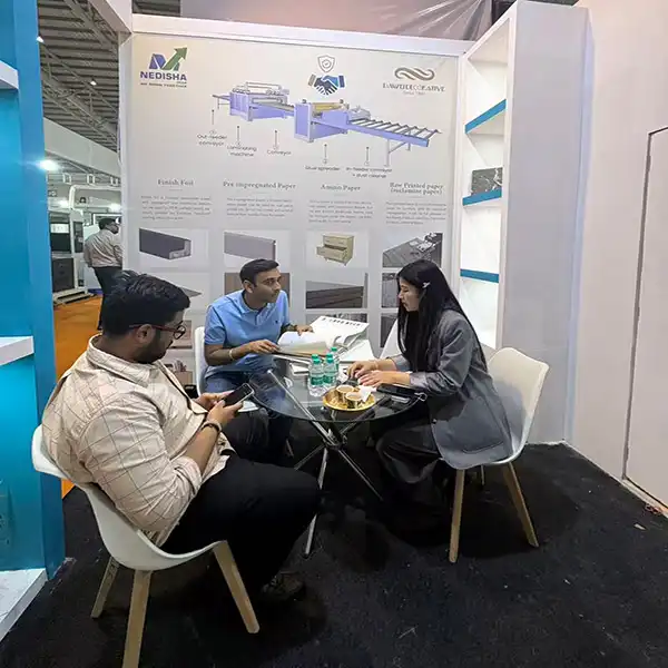 Dawei Sales talking with customer at India 2026