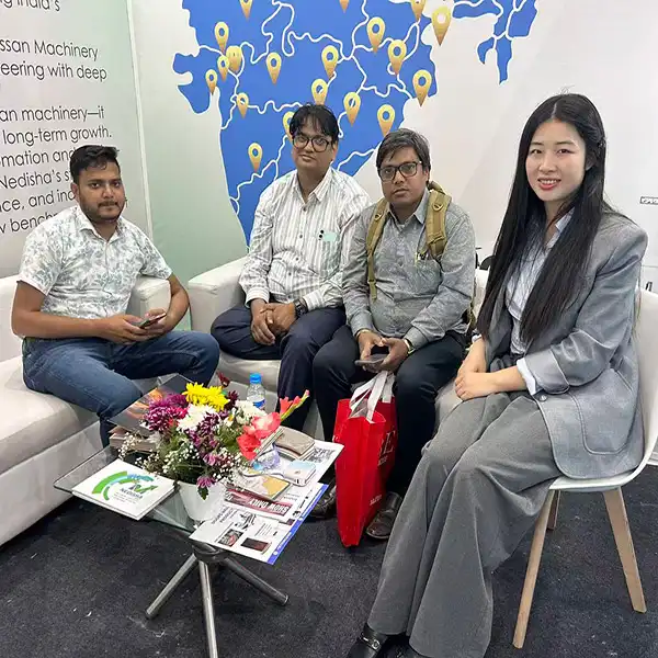 Nina & customers in India Wood